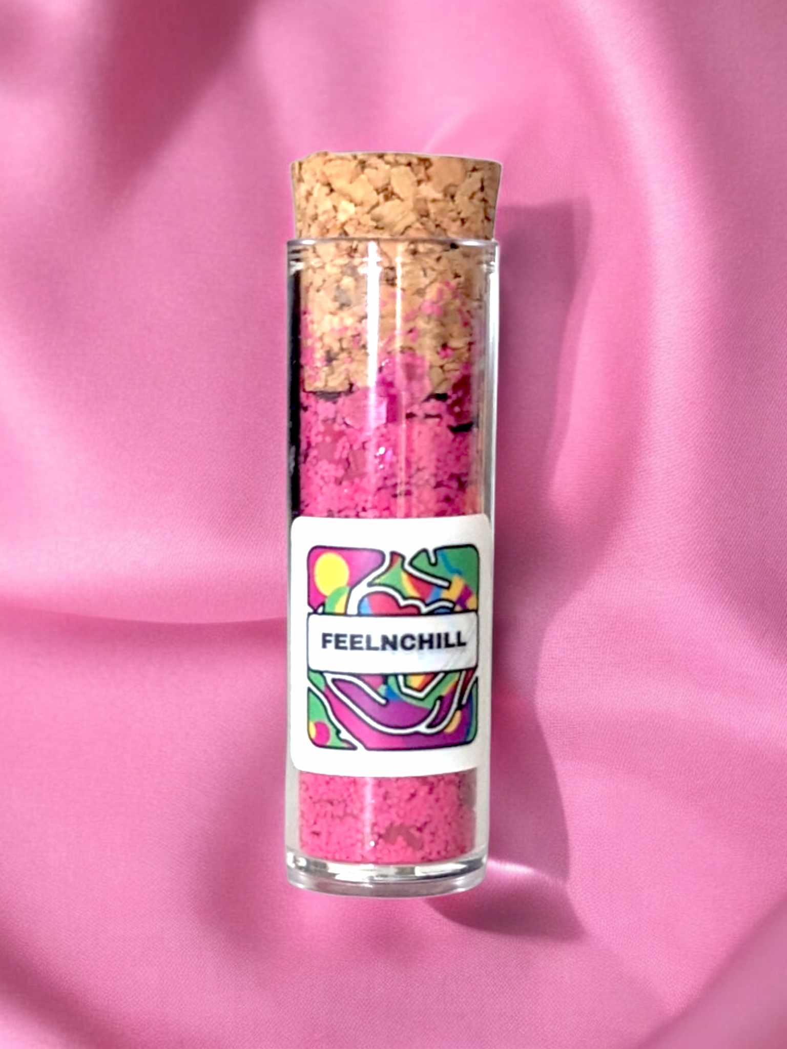 Pot de paillettes biodégradables Feelnchill couleur rose, doux pour la peau.